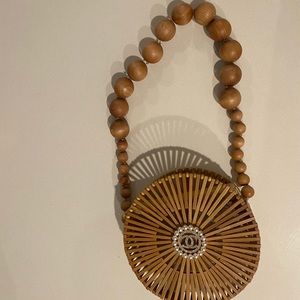 Bamboo shoulder bag with CC broach pin